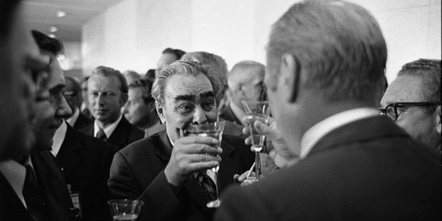 President Gerald R. Ford and Soviet General Secretary Leonid Brezhnev Raise Their Glasses in a Toast Following the Signing of the Final Act of the Conference on Security and Cooperation in Europe (CSCE), in Helsinki, Finland